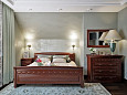 Дизайн спальни на мансардном этаже в классическом стиле
